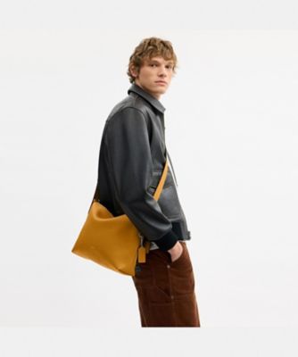 モット メッセンジャー バッグ 33 | COACH/コーチ | 三越伊勢丹